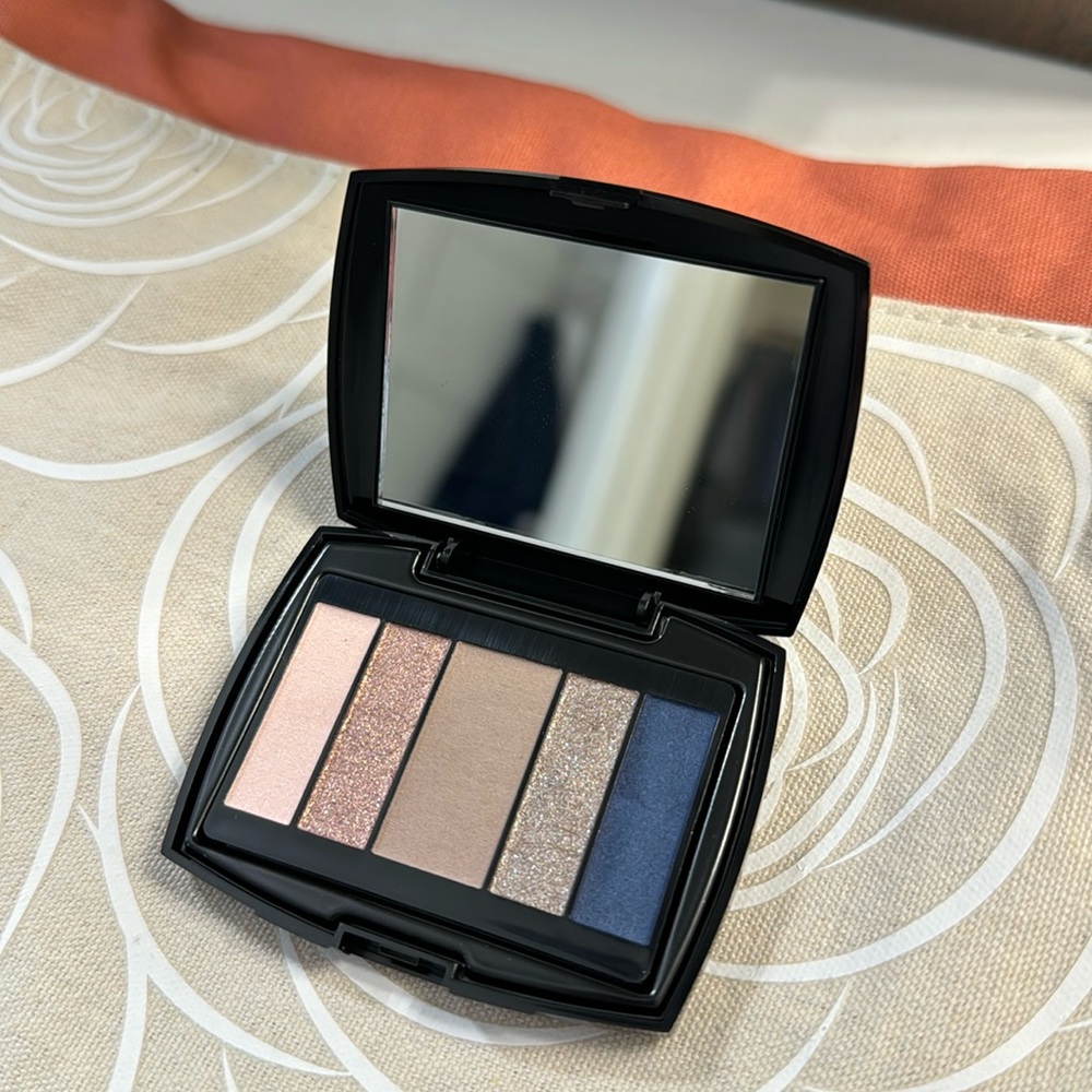 Lancôme eyeshadow and makeup bag